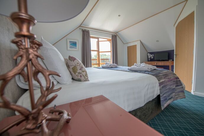 Imagen de la habitación del Hotel Loch Lomond Waterfront Luxury Lodges. Foto 15