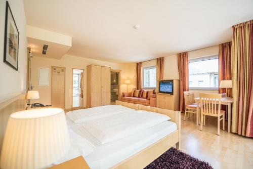 Imagen de la habitación del Hotel Lodenwirt Residence. Foto 19
