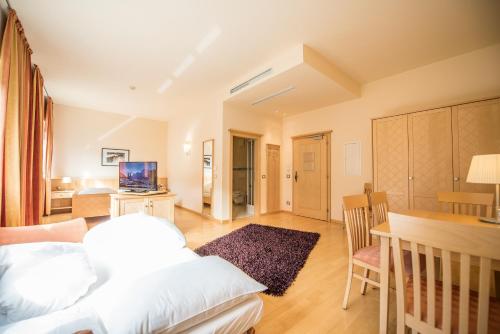 Imagen de la habitación del Hotel Lodenwirt Residence. Foto 20