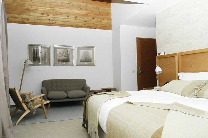 Imagen de la habitación del Hotel Lodge El Morado. Foto 17