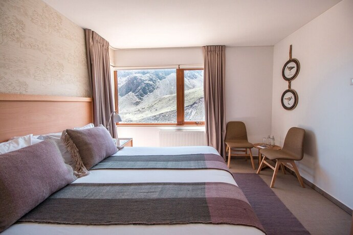 Imagen de la habitación del Hotel Lodge El Morado. Foto 20