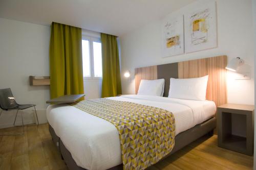 Imagen de la habitación del Hotel Lodge In Paris 13. Foto 2