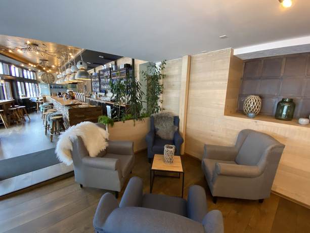 Imagen del bar/restaurante del Hotel Lodge Inn, Fiesch. Foto 1