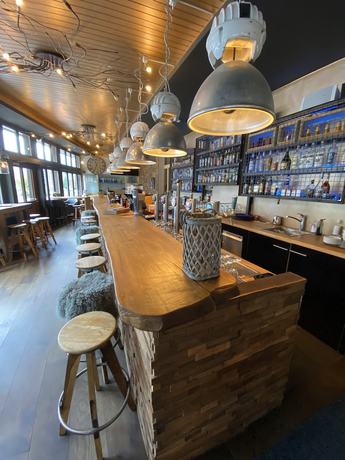 Imagen del bar/restaurante del Hotel Lodge Inn, Fiesch. Foto 6