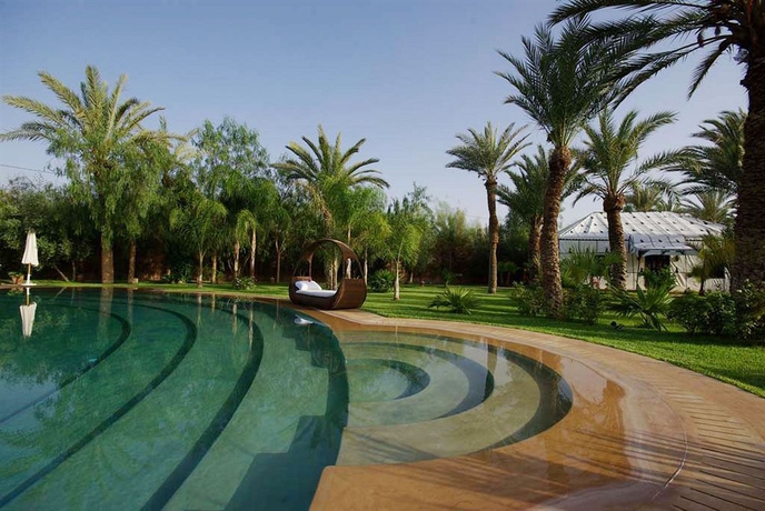Imagen de la piscina del Hotel Lodge K. Foto 13