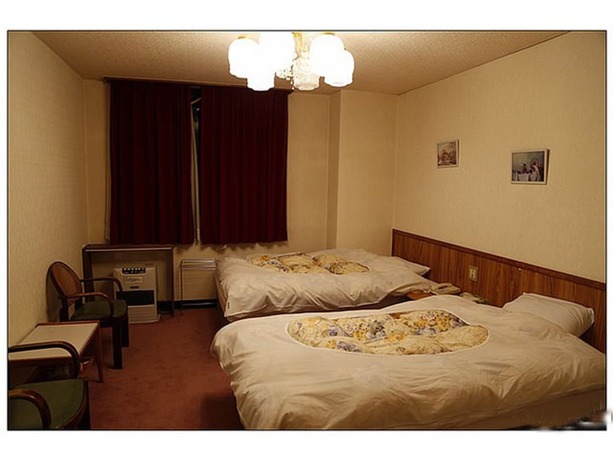 Imagen de la habitación del Hotel Lodge Oka. Foto 18