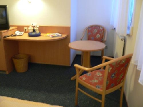 Imagen de la habitación del Hotel Loewen. Foto 9