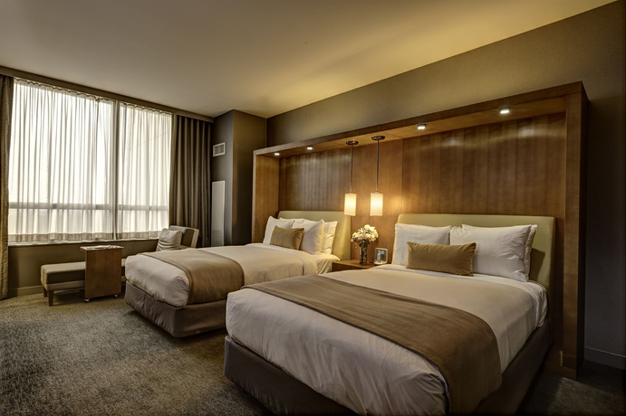 Imagen de la habitación del Hotel Loews Chicago O'hare. Foto 10