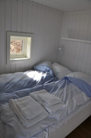 Imagen de la habitación del Hotel Lofoten Links Lodges. Foto 13