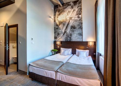 Imagen de la habitación del Hotel Loft 1898, Suwalki. Foto 8