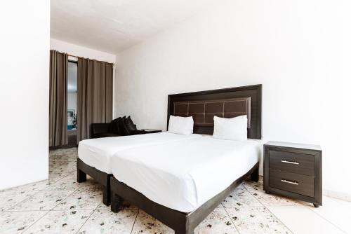 Imagen de la habitación del Hotel Loft Malec&oacute;n Vallarta. Foto 11