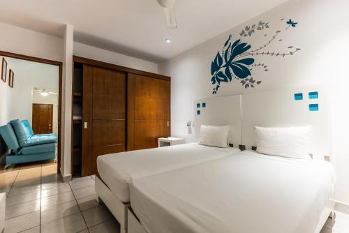 Imagen de la habitación del Hotel Loft Malec&oacute;n Vallarta. Foto 12