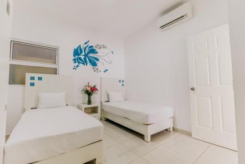 Imagen de la habitación del Hotel Loft Malec&oacute;n Vallarta. Foto 14