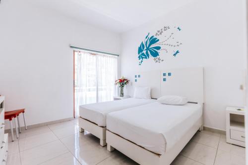 Imagen de la habitación del Hotel Loft Malec&oacute;n Vallarta. Foto 16