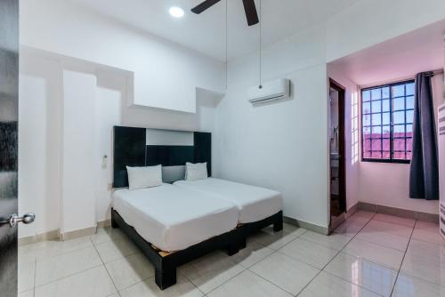 Imagen de la habitación del Hotel Loft Malec&oacute;n Vallarta. Foto 17