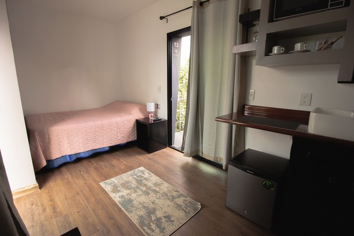 Imagen de la habitación del Hotel Lofts Amore. Foto 8