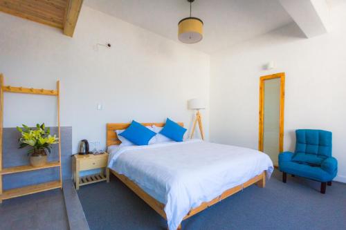 Imagen general del Hotel Log Cabin, Dali. Foto 4