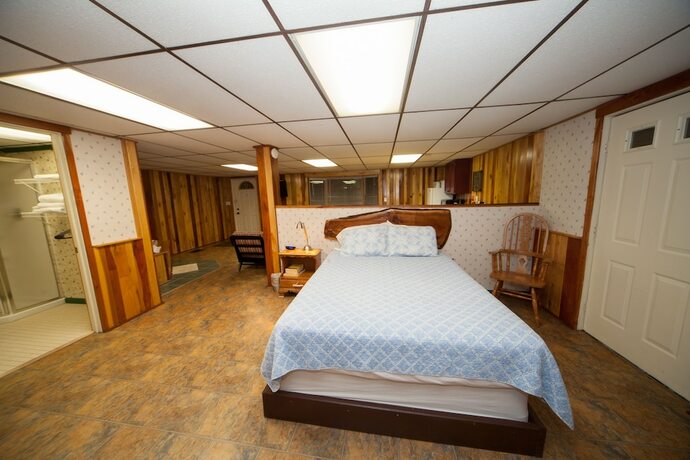 Imagen de la habitación del Hotel Log Cabin Lodge and Suites. Foto 11