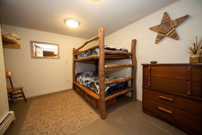 Imagen de la habitación del Hotel Log Cabin Lodge and Suites. Foto 12