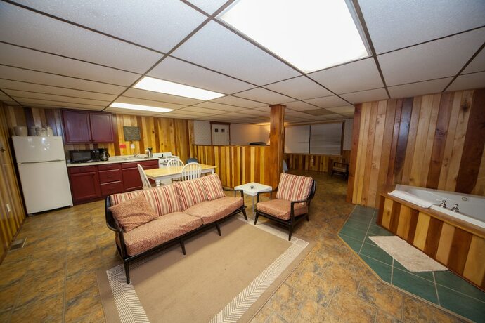 Imagen de la habitación del Hotel Log Cabin Lodge and Suites. Foto 14