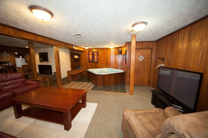 Imagen de la habitación del Hotel Log Cabin Lodge and Suites. Foto 15