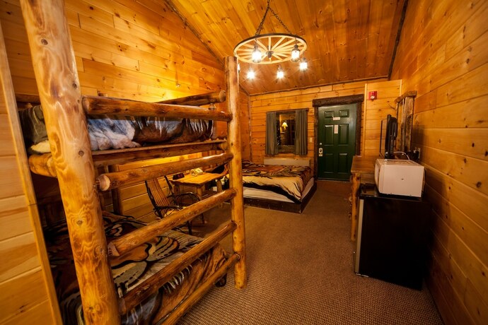 Imagen de la habitación del Hotel Log Cabin Lodge and Suites. Foto 20