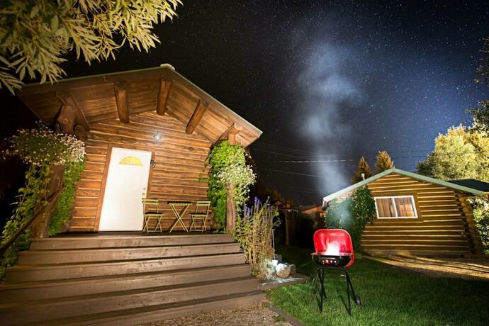 Imagen de la habitación del Hotel Log Cabin Motel. Foto 11