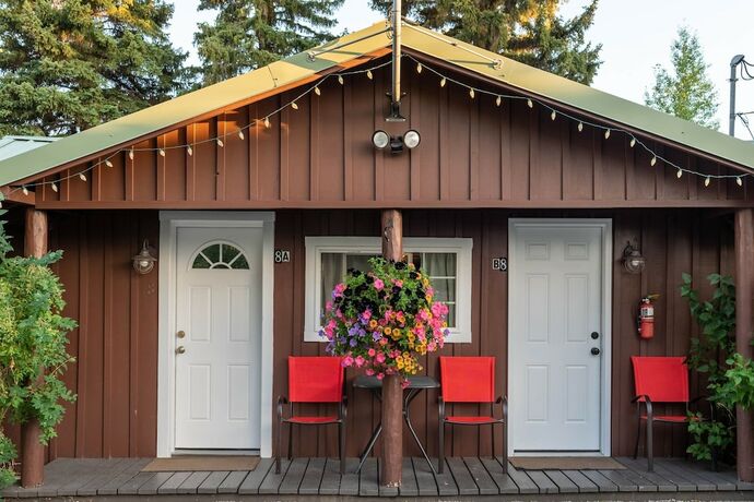 Imagen de la habitación del Hotel Log Cabin Motel. Foto 14