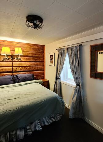 Imagen general del Hotel Log Cabin Motel. Foto 5