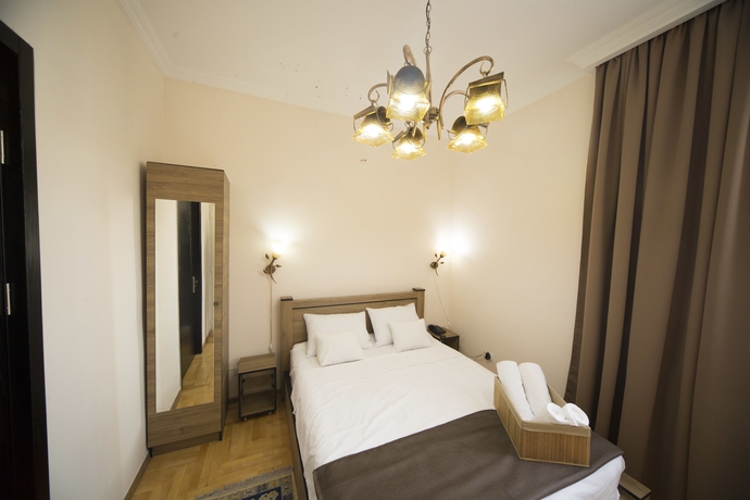 Imagen de la habitación del Hotel Log Inn Boutique. Foto 4