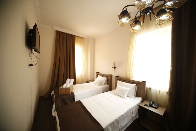 Imagen de la habitación del Hotel Log Inn Boutique. Foto 12
