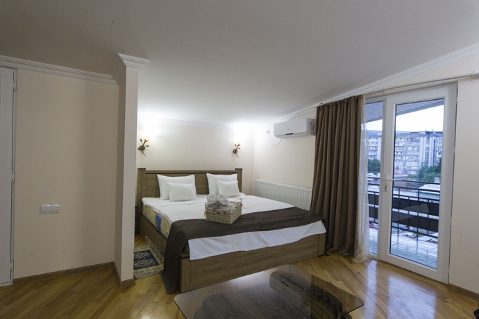 Imagen de la habitación del Hotel Log Inn Boutique. Foto 18