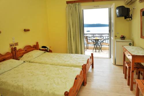 Imagen de la habitación del Hotel Logan's Beach. Foto 2