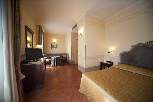 Imagen de la habitación del Hotel Logge Dei Mercanti. Foto 3