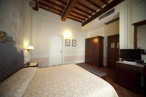 Imagen de la habitación del Hotel Logge Dei Mercanti. Foto 15