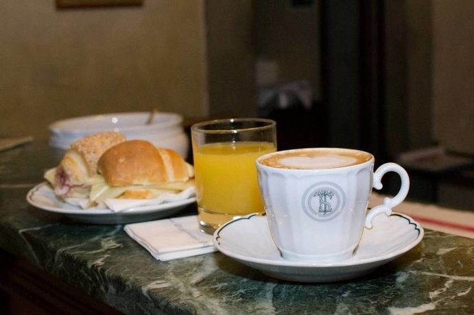 Imagen del bar/restaurante del Hotel Loggiato Dei Serviti. Foto 4