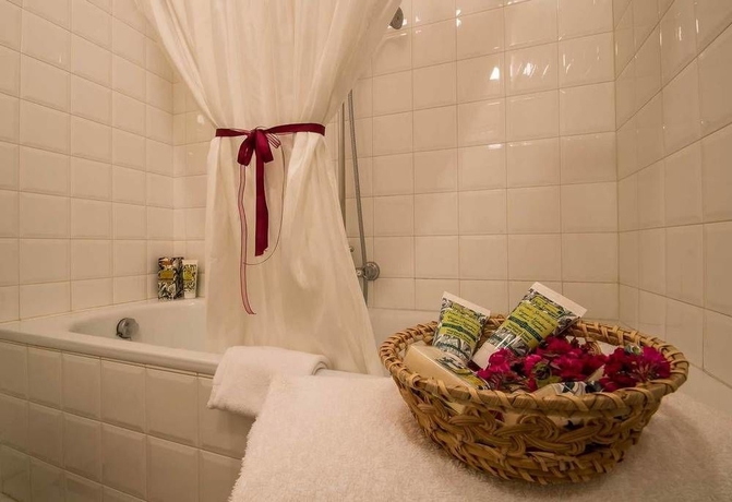 Imagen de la habitación del Hotel Loggiato Dei Serviti. Foto 13