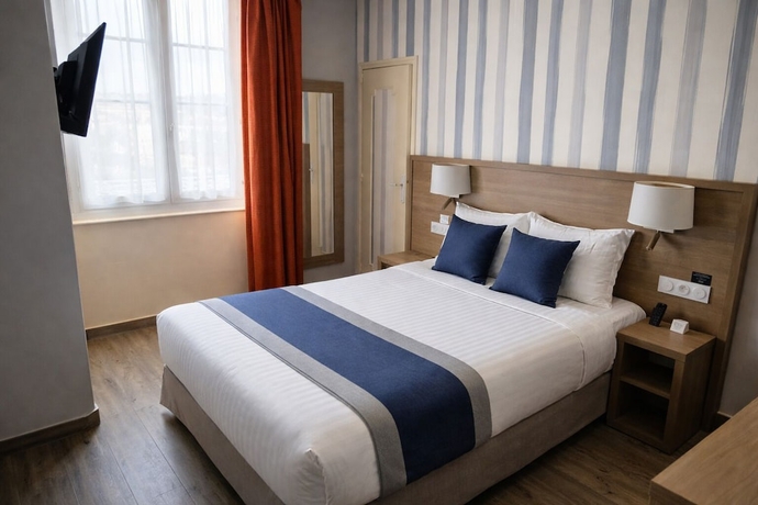 Imagen de la habitación del Hotel Logis Au Grand Hotel. Foto 10