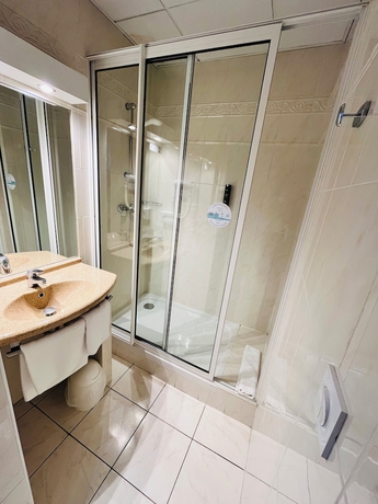 Imagen de la habitación del Hotel Logis Au Grand Hotel. Foto 11