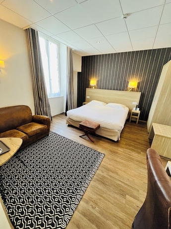 Imagen de la habitación del Hotel Logis Au Grand Hotel. Foto 13