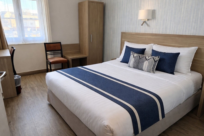 Imagen de la habitación del Hotel Logis Au Grand Hotel. Foto 14