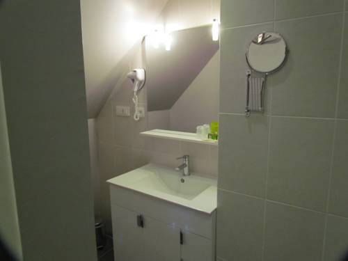 Imagen de la habitación del Hotel Logis Au Site Normand. Foto 7