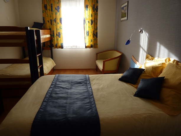 Imagen de la habitación del Hotel Logis Au Tambour. Foto 9