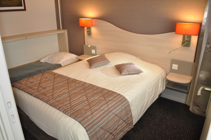 Imagen de la habitación del Hotel Logis Au Tambour. Foto 10