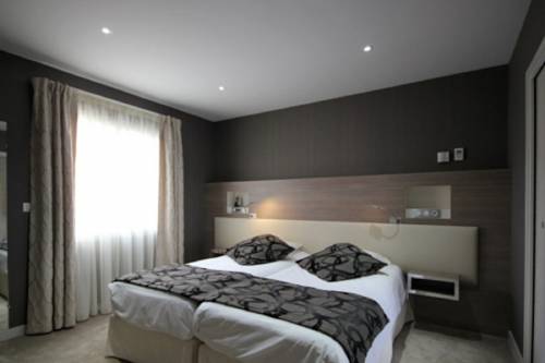 Imagen de la habitación del Hotel Logis Auberge Bienvenue. Foto 6