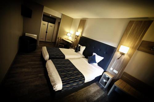 Imagen de la habitación del Hotel Logis Auberge Des Moissons. Foto 6