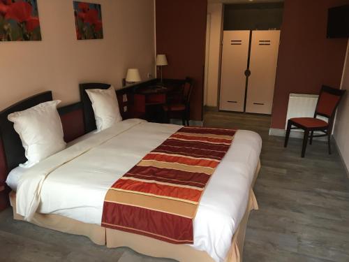 Imagen de la habitación del Hotel Logis Auberge Des Moissons. Foto 8