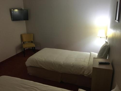 Imagen de la habitación del Hotel Logis Auberge Des Moissons. Foto 9