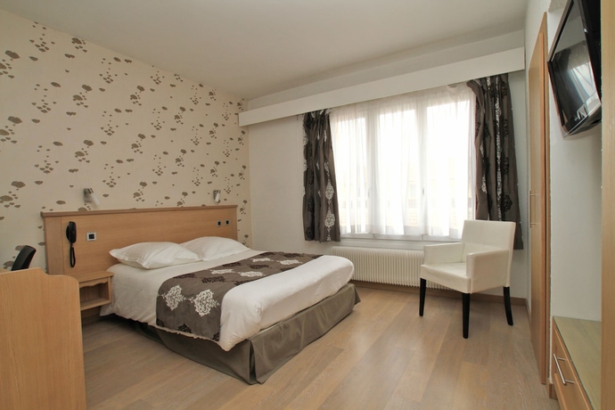 Imagen de la habitación del Hotel Logis Beau-site. Foto 19