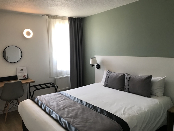 Imagen de la habitación del Hotel Logis Cris , Lyon Sud. Foto 11